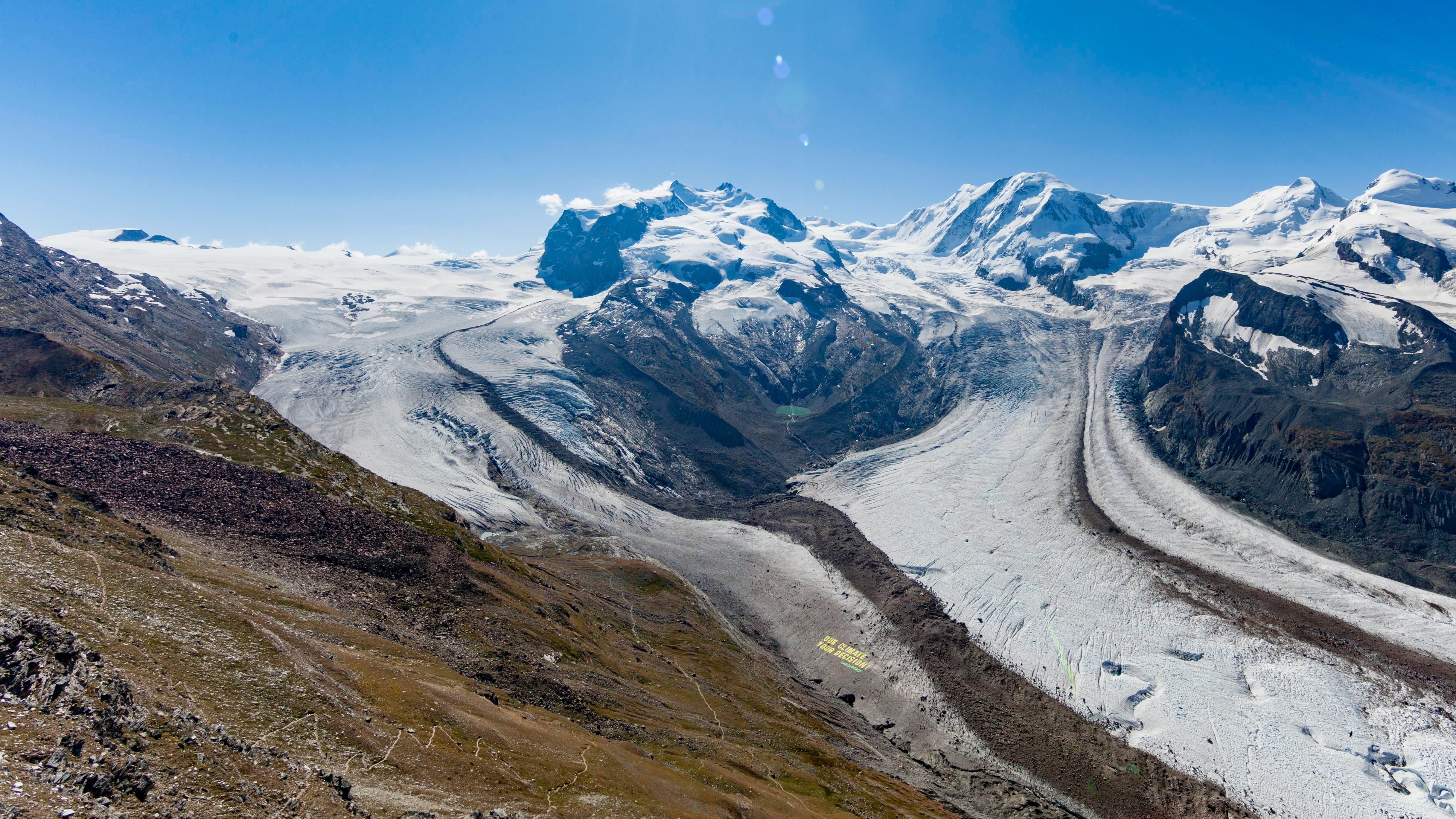 snow covered mountain under blue sky during daytime